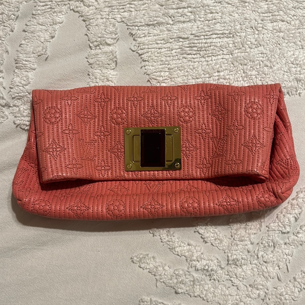 Embroidered leather clutch